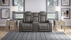 HyllMont Gray Power Reclining Console Loveseat W/ Adjustable Headrests
