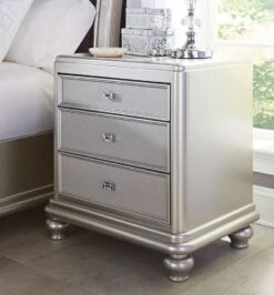 Coralayne Upholstered Bedroom Set -Signature Design by Ashley B650 93 nightstand 1