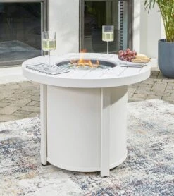 Sundown Treasure Fire Pit Table Set W/ Blue Chairs -Signature Design by Ashley P011 776 table 2