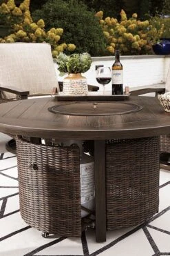 Paradise Trail Round Fire Pit Table -Signature Design by Ashley P750 776 table 3 1